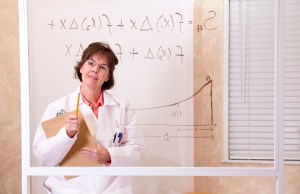 Mathematician working on calculus equation