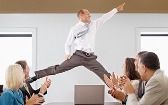 Businessman Midair in a Business Meeting