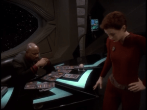 Even a StarFleet Captain like Benjamin Sisko can find this sort of thing daunting, and needs to seek Kira's help in straightening this out!