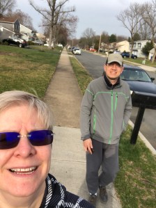 Photo of TechCommGeekMom and hubby walking in their neighborhood.
