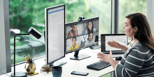 Photo of woman doing remote tech work from home/Photo by Microsoft.